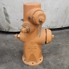 Orange Clow Main Fire Hydrant 996G T1630960 Series 2008 200WWP. Fixed Price $3000.00.