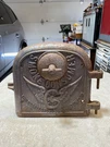 Antique Cast Iron Stove Fire Door Smoke Consumer Wings & Wheel 1920 The Estate. Fixed Price $119.00.