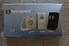 Brand New Inovonics FA205D Double-button Belt Clip Transmitter. Fixed Price $50.00.