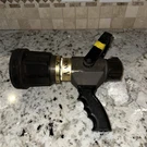 Akron Saberjet 1-1/2" Nozzle Style #1523 W/pistol Grip. Fixed Price $300.00.