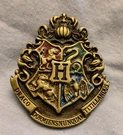 Harry Potter Hogwarts Badge Gold Lustre Wizzarding World Of Universal Studios. Fixed Price $12.08.